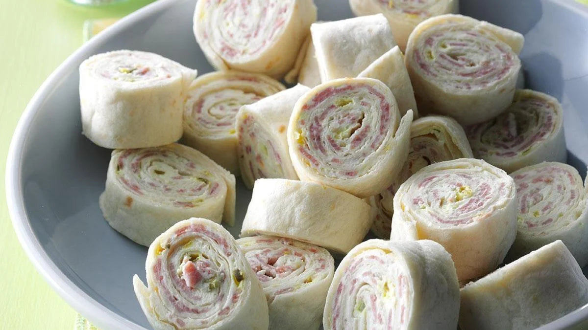Wrap cream-cheese with salami and chorizo